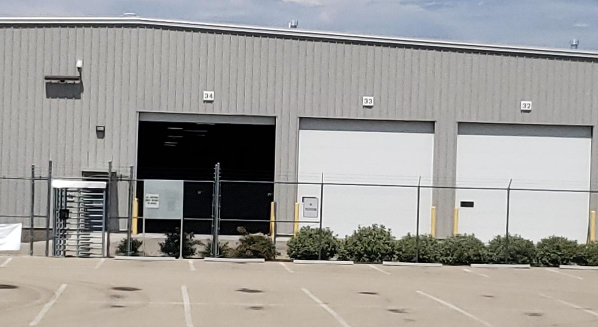 The warehouse obtained by Amazon has 18 docks for use by semi trucks to unload packages.