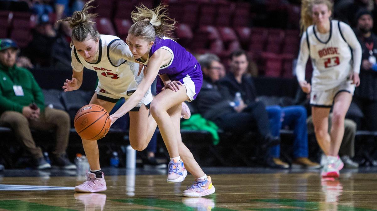 Rocky Mountain guard Averee Osterhout, right, steals the ball from Boise’s Avery Patricco in the 5A District Three girls basketball championship game Feb. 9 at Idaho Central Arena in downtown Boise. Both teams will compete for a 5A state title this week at the Ford Idaho Center in Nampa