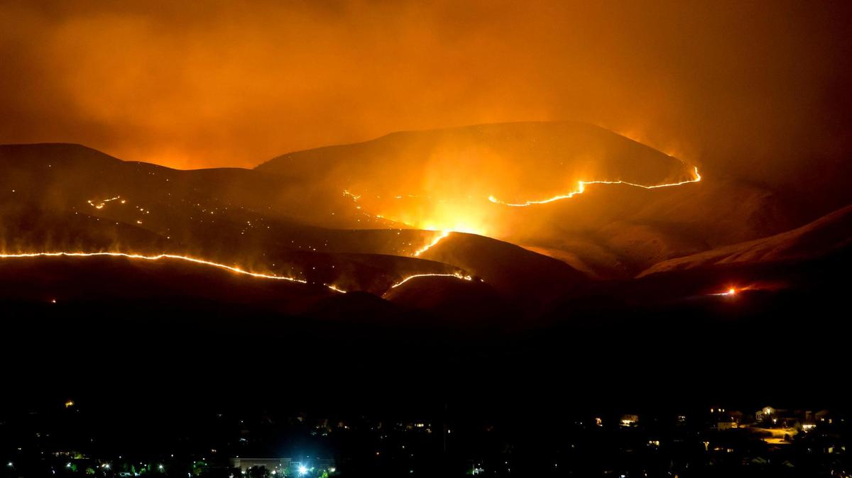 The Table Rock Fire burns the Boise Foothills above Harris Ranch in the early morning hours of Thursday, June 30, 2016. The fire was caused by fireworks.