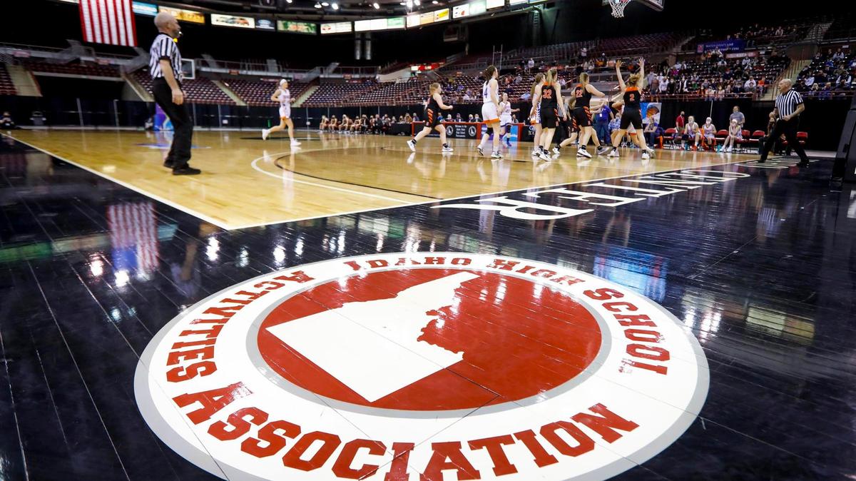 The Idaho High School Activities Association logo is displayed on the court at the Ford Idaho Center in Nampa during the 1A Division II girls basketball state championship game between Tri-Valley and Kendrick.