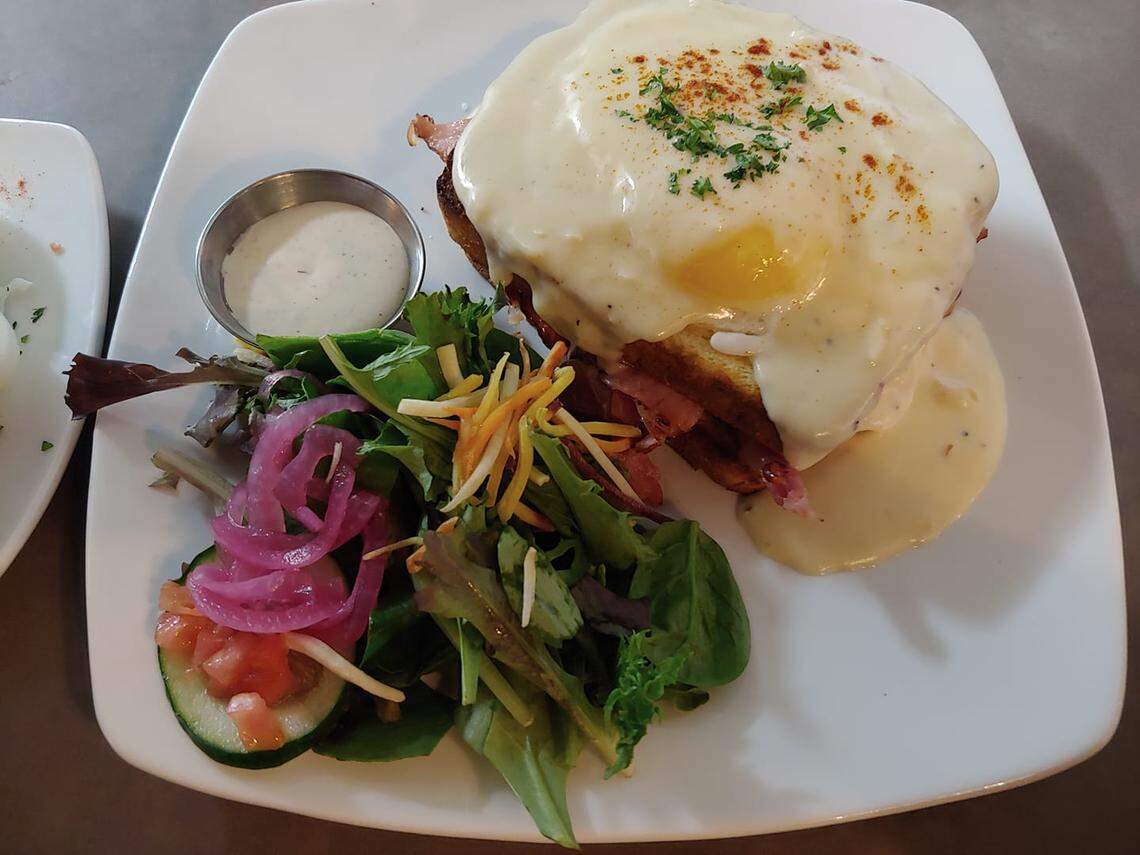 Croque Madame ($11.95): Ham and Swiss covered in cheese sauce and topped with a fried egg.