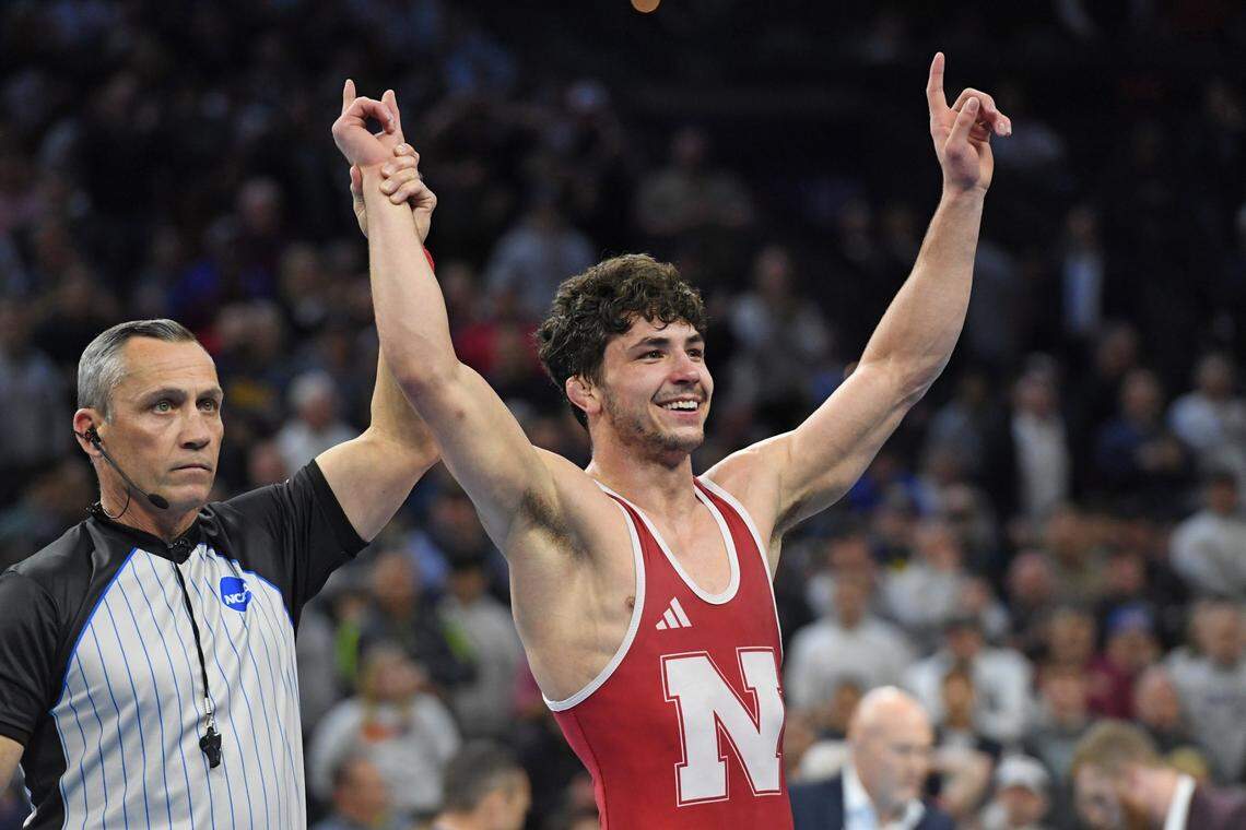 Mar 22, 2025; Philadelphia, PA, USA; Ridge Lovett of the Nebraska Cornhuskers reacts after defeating Caleb Henson of the Virginia Tech Hokies (not pictured) during the Division I Men's Wrestling Championship held at Wells Fargo Center. Mandatory Credit: Eric Hartline-Imagn Images