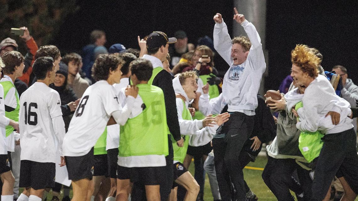 The Bishop Kelly boys soccer team celebrates after winning its first state title since 1996 with a 3-1 victory over Sandpoint on Saturday at Middleton High.