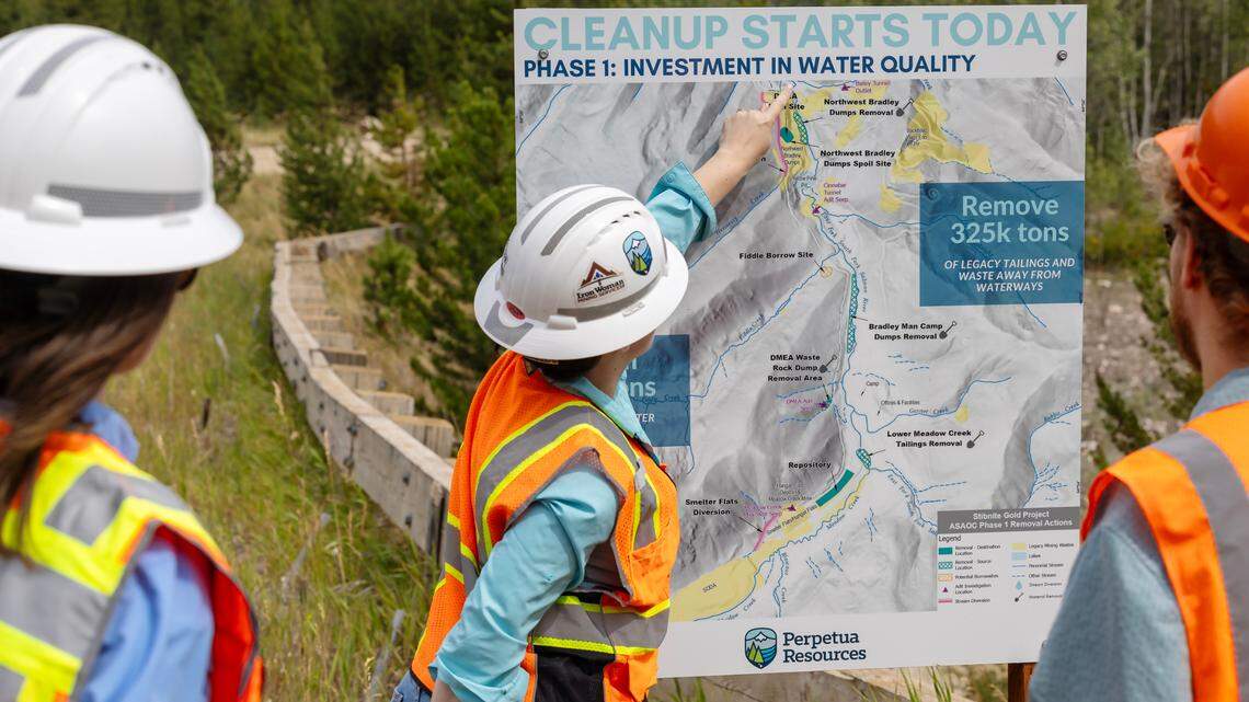 Mckinsey Lyon, center, spokesperson for Perpetua Resources, points out some of the mining company’s environmental restoration plans at its proposed Stibnite Gold Project site near Yellow Pine. The company hopes to begin mining operations for gold and antimony in 2028.