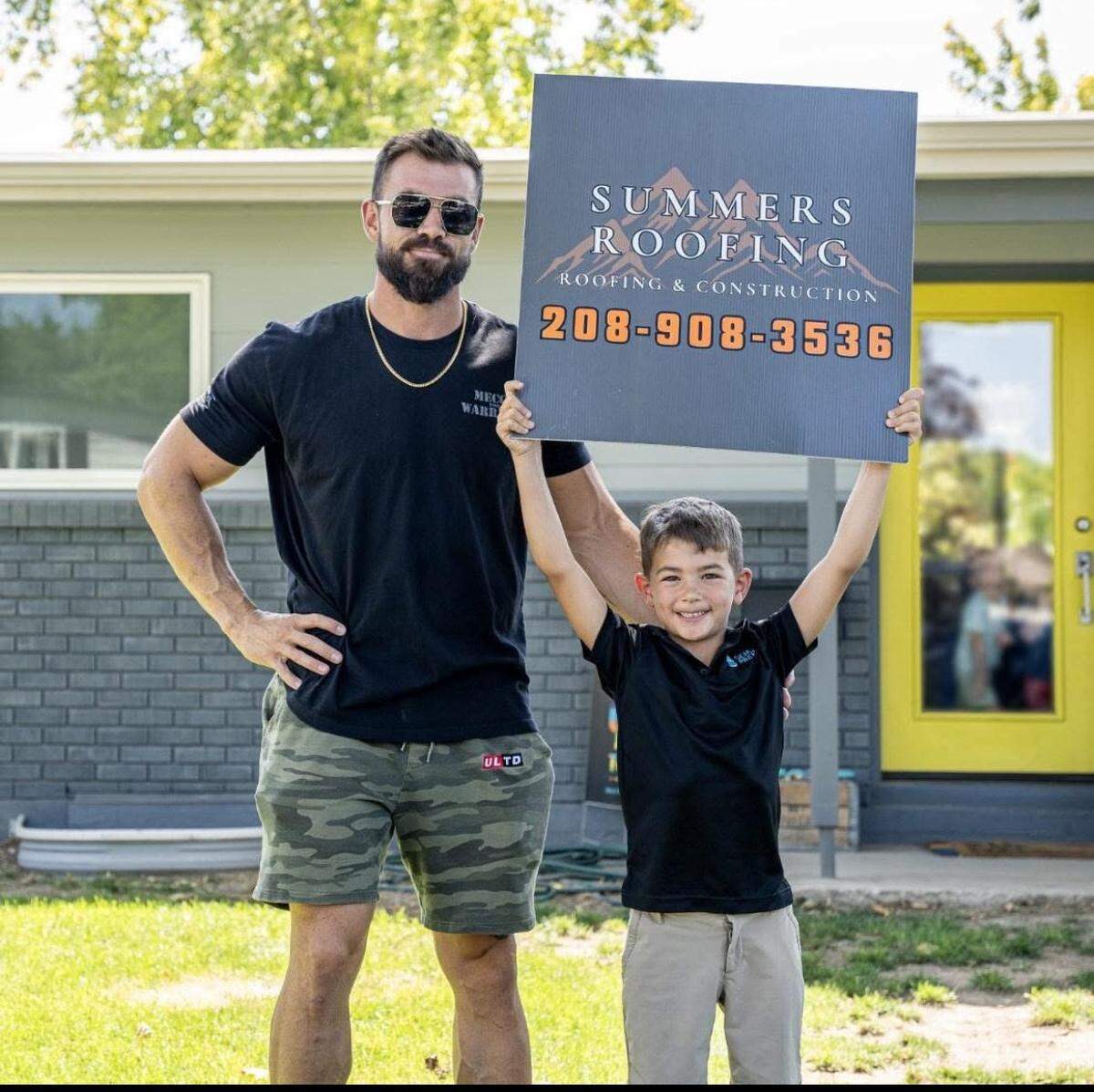 Austin Summers stands with Graham Summers.