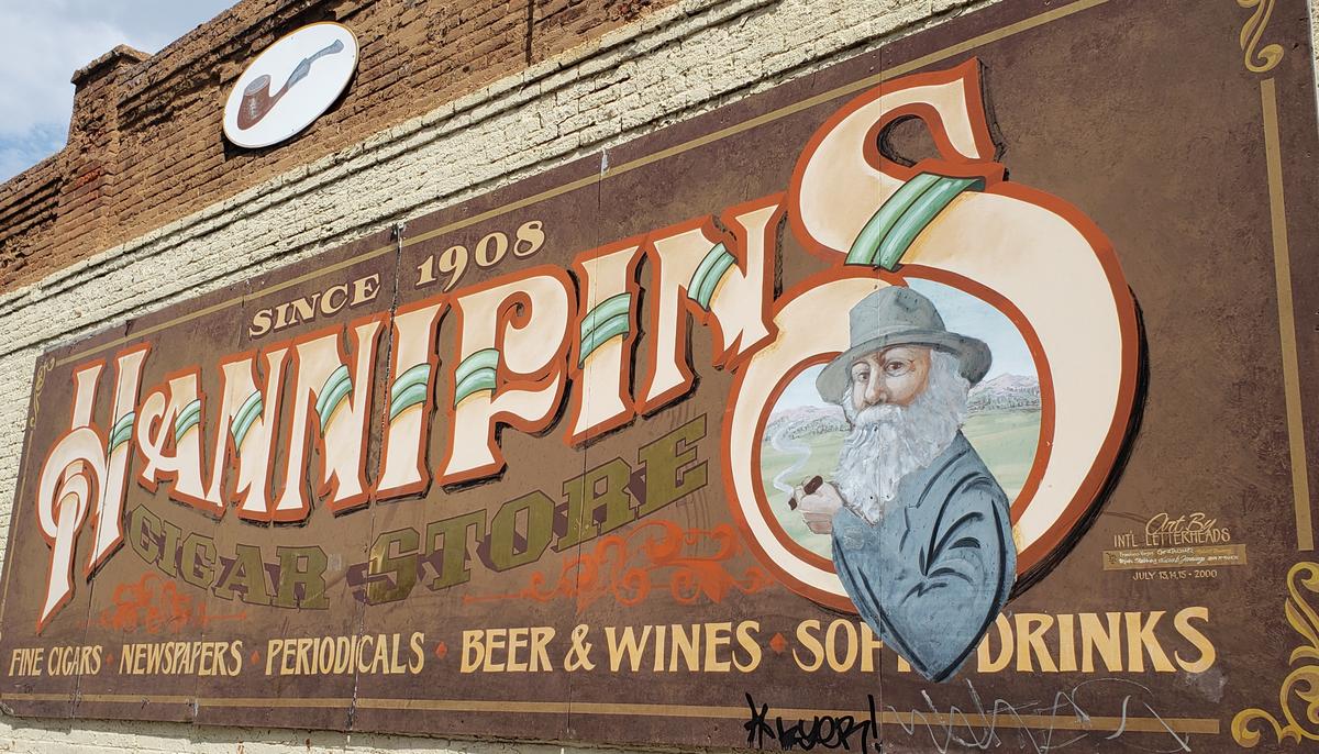 A mural for Hannifin’s Cigar Store adorned the 11th Street side of the shop.