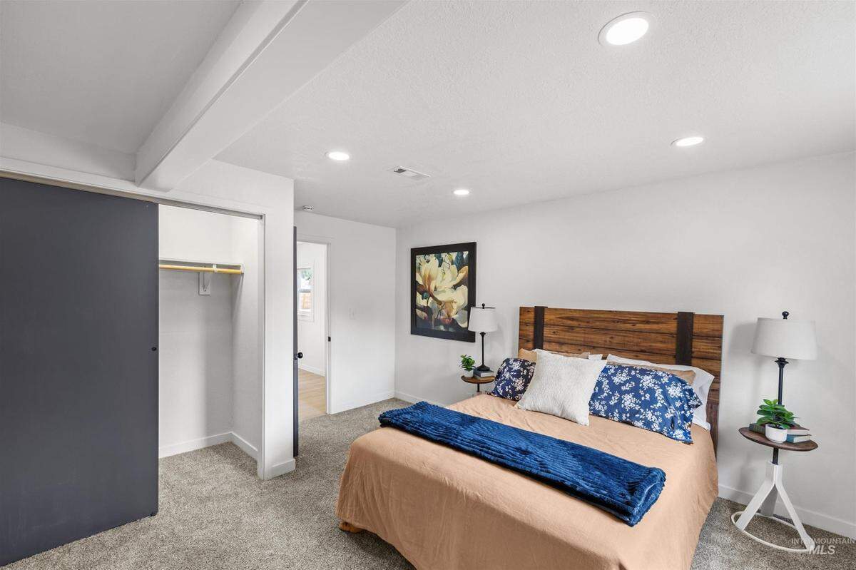 An “after” photo shows the bedroom of the Boise house that won HomeVestors of America’s Ugliest House of the Year contest in 2025 after undergoing renovations.