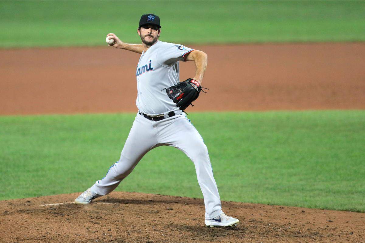 Miami Marlins relief pitcher James Hoyt throws a pitch to the Baltimore Orioles during the sixth inning of a baseball game, Tuesday, Aug. 4, 2020, in Baltimore. (AP Photo/Julio Cortez)