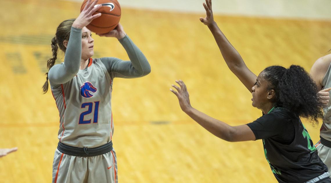 Boise State guard Riley Lupfer pulls up and scores a 3-pointer defended by Utah Valley guard Alexis Cortez in the fourth quarter Tuesday, Nov. 26, 2019 at ExtraMile Arena in Boise. Lupfer scored 23 points in the Broncos’ 77-69 win.