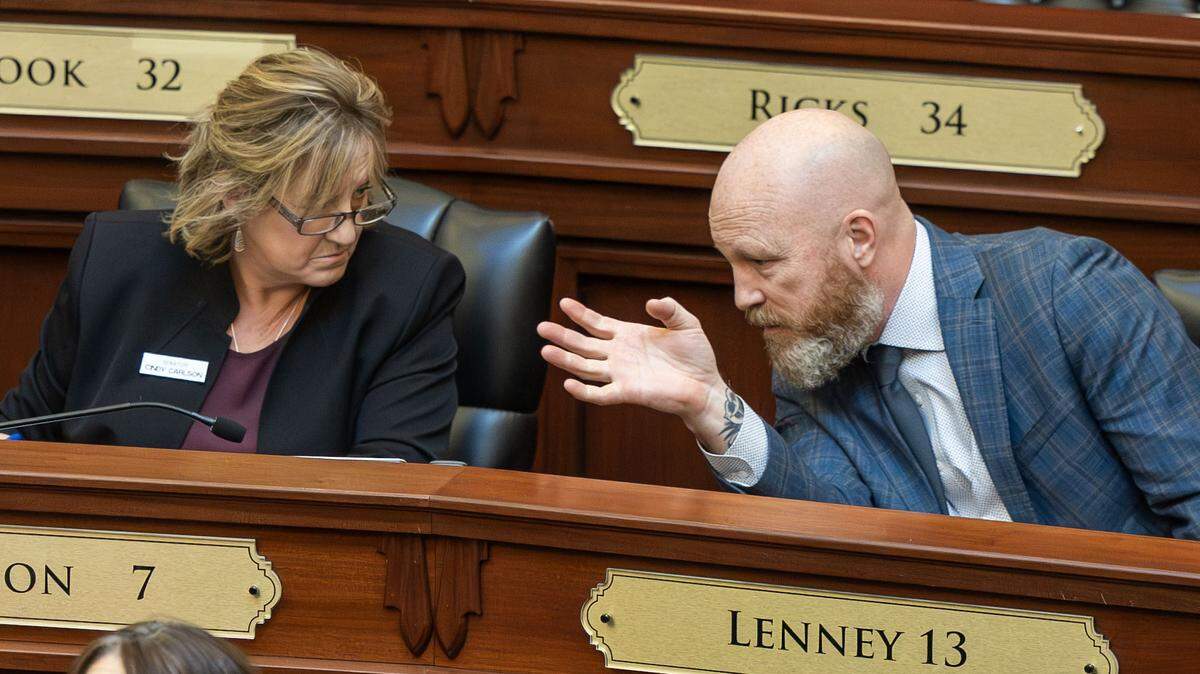 Sen. Brian Lenney, R-Nampa, makes a comment to Sen. Cindy J. Carlson, R-Riggins, during business on the floor of the Idaho Senate at the Statehouse in Boise, Thursday, Jan. 29, 2026.