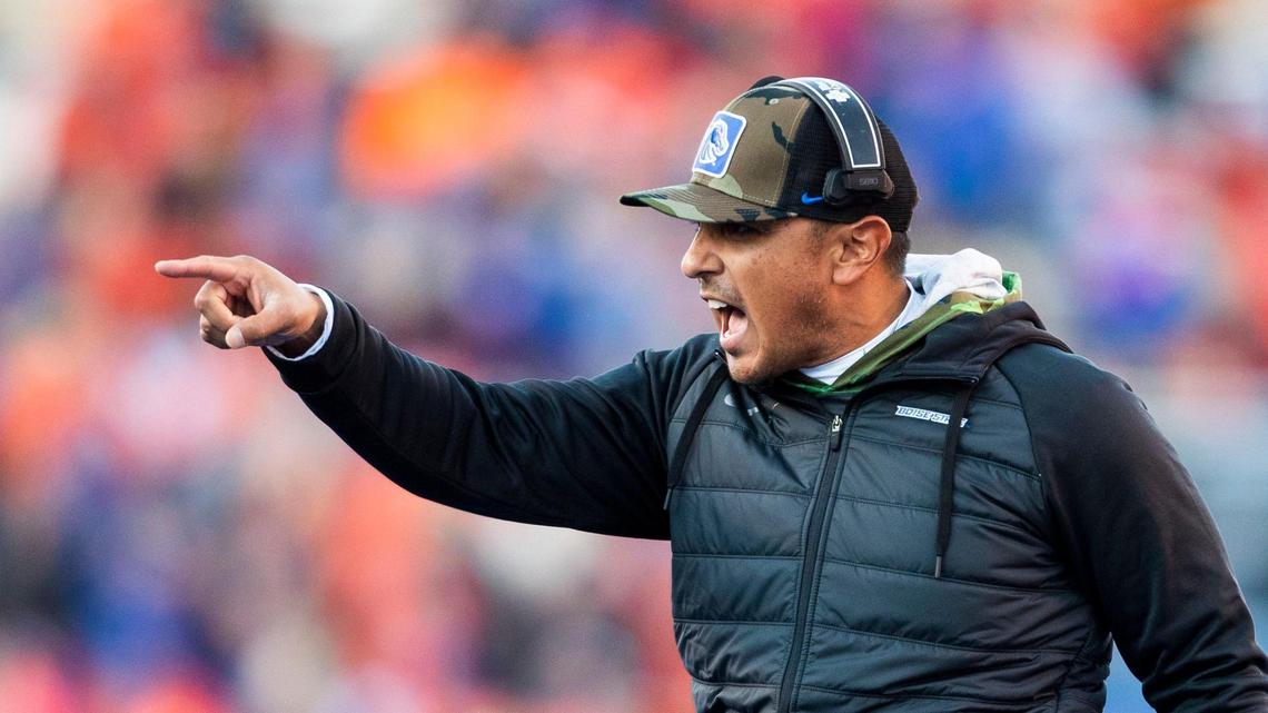 Boise State coach Andy Avalos celebrates a touchdown in the team’s blowout win over Colorado State on Saturday at Albertsons Stadium..