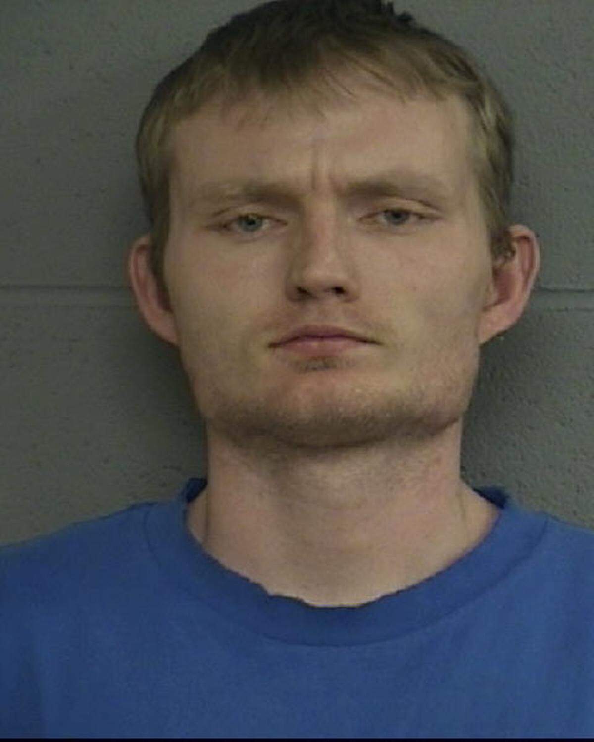 Ian Stone, pictured after an arrest in February 2007.