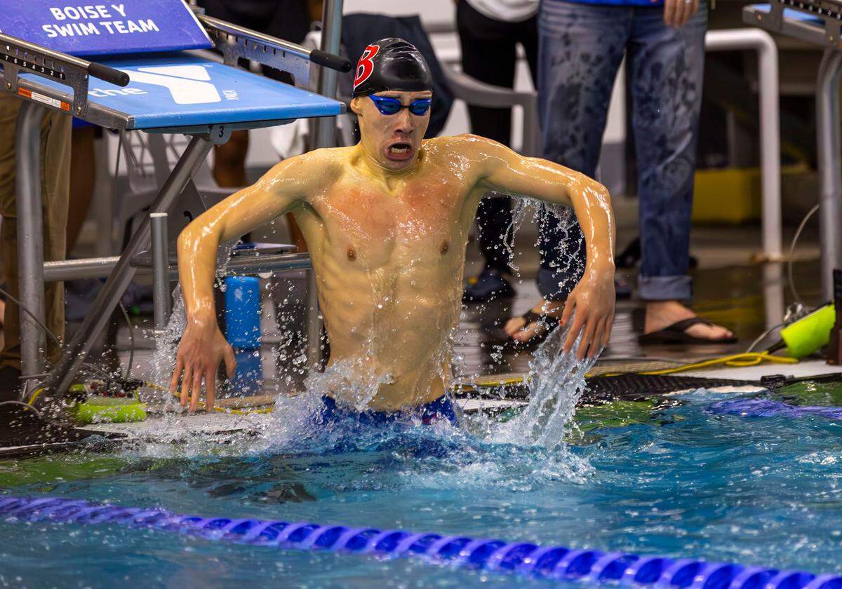 Boise senior Jasper Shue reacts after setting an all-class state record of 46.09 seconds in the 100-yard freestyle Saturday at the West YMCA.
