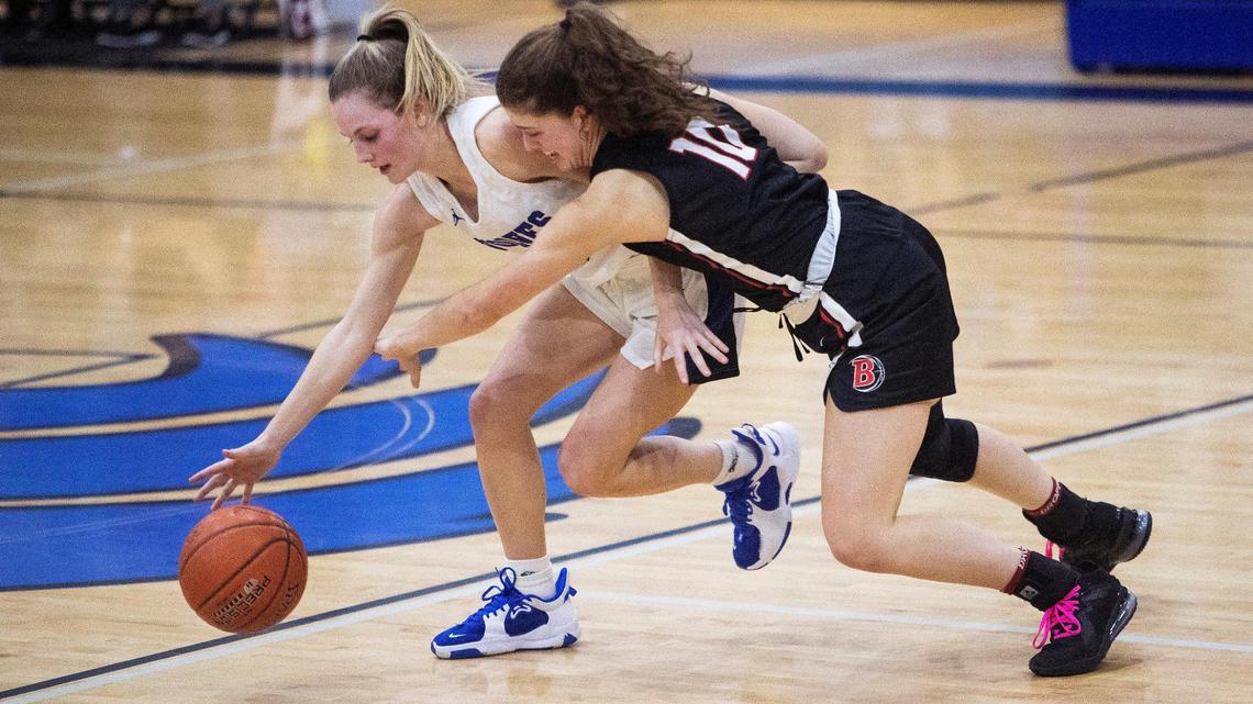 Timberline junior Lauren McCall draws a foul while defended by Boise senior Ella Nelson on Jan. 25.