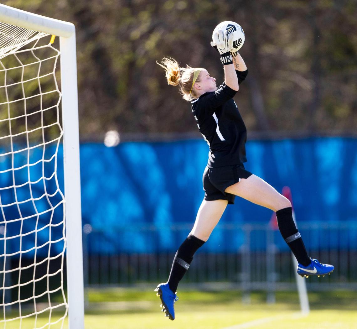Boise State goalkeeper Sydney Smith saves a high-arching kick in the Broncos’ Mountain West women’s soccer game against San Diego State on Friday, April 9, 2021, at Boas Soccer Complex in Boise.