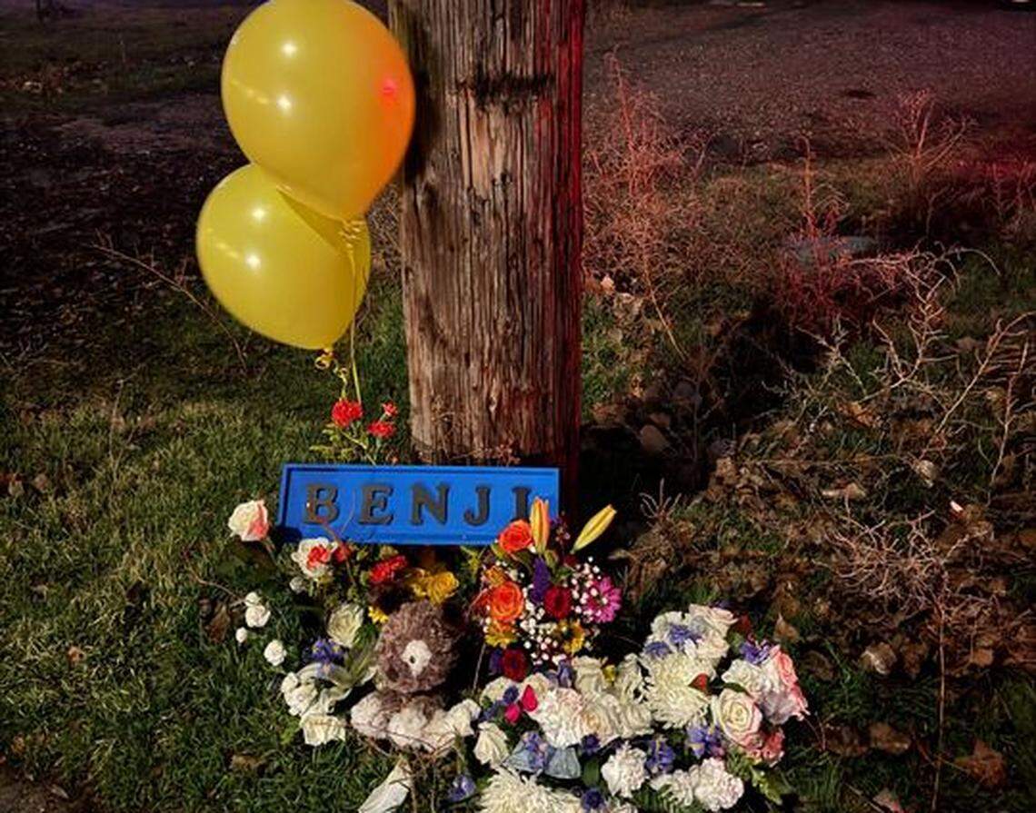 Members of the community placed flowers, balloons and a sign at the residence where the infant was found dead.