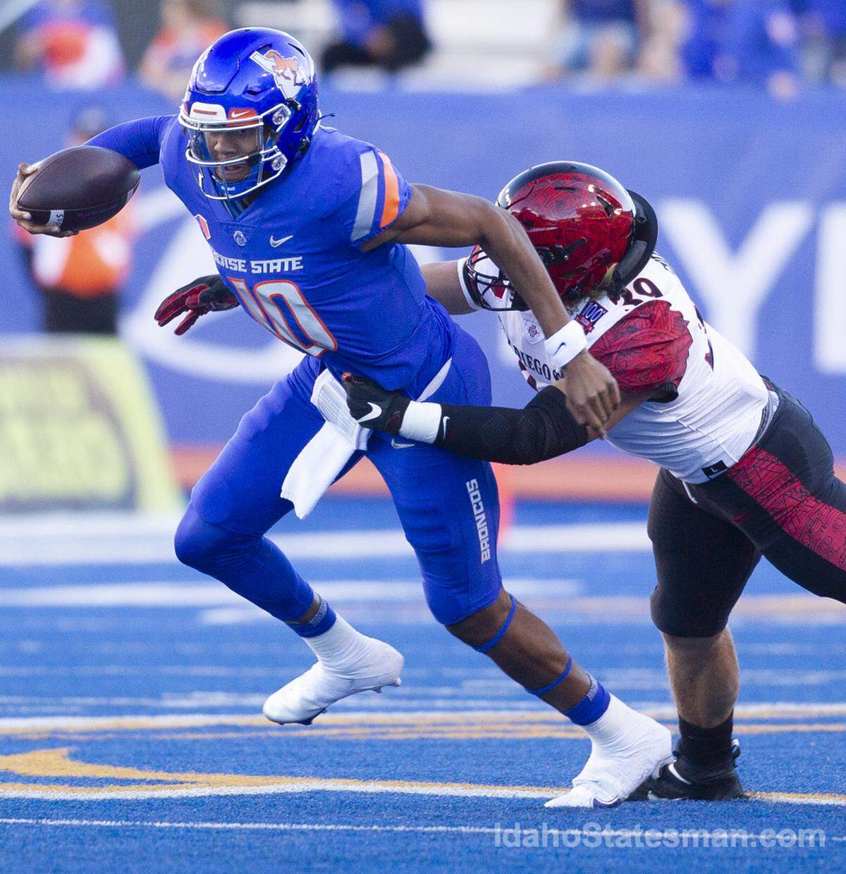 San Diego State defensive lineman Garret Fountain tackles Boise State quarterback Taylen Green during the first half. Boise State defeated San Diego State University 35-13 at Albertsons Stadium.