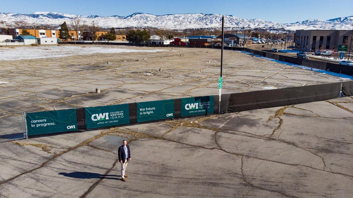 College of Idaho President Gordon Jones stands at the former car dealership planned to become CWI’s Boise campus. The site is at the northwest corner of Main Street and Whitewater Park Boulevard in Boise’s West End. It adjoins the Boise River Greenbelt.