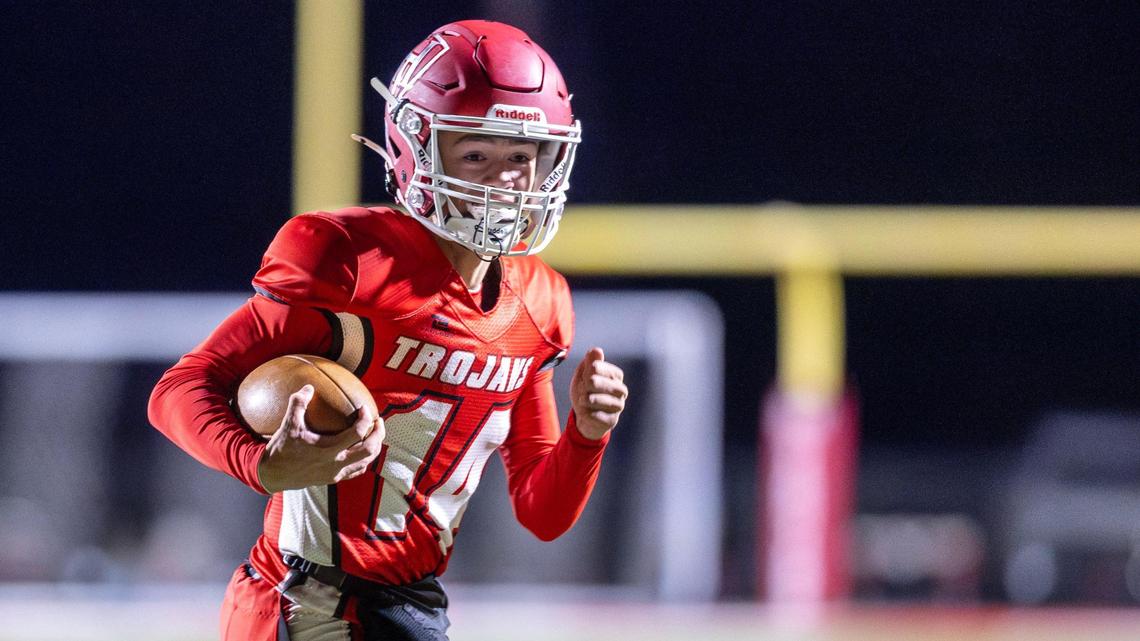 Homedale quarterback Xavier Uranga runs for a first-quarter touchdown in a 4A state semifinal vs. Weiser last season. 