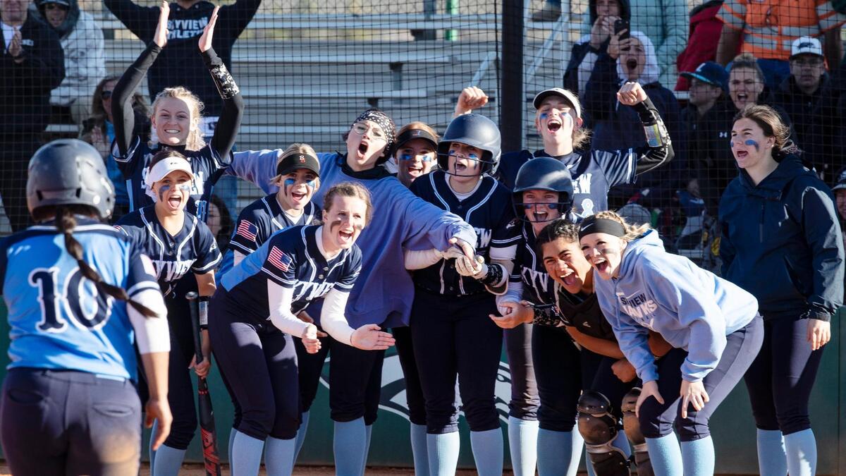 Skyview cheers on Analisa Zamora as rounds third and heads home after a two-run home run Friday at Eagle High.