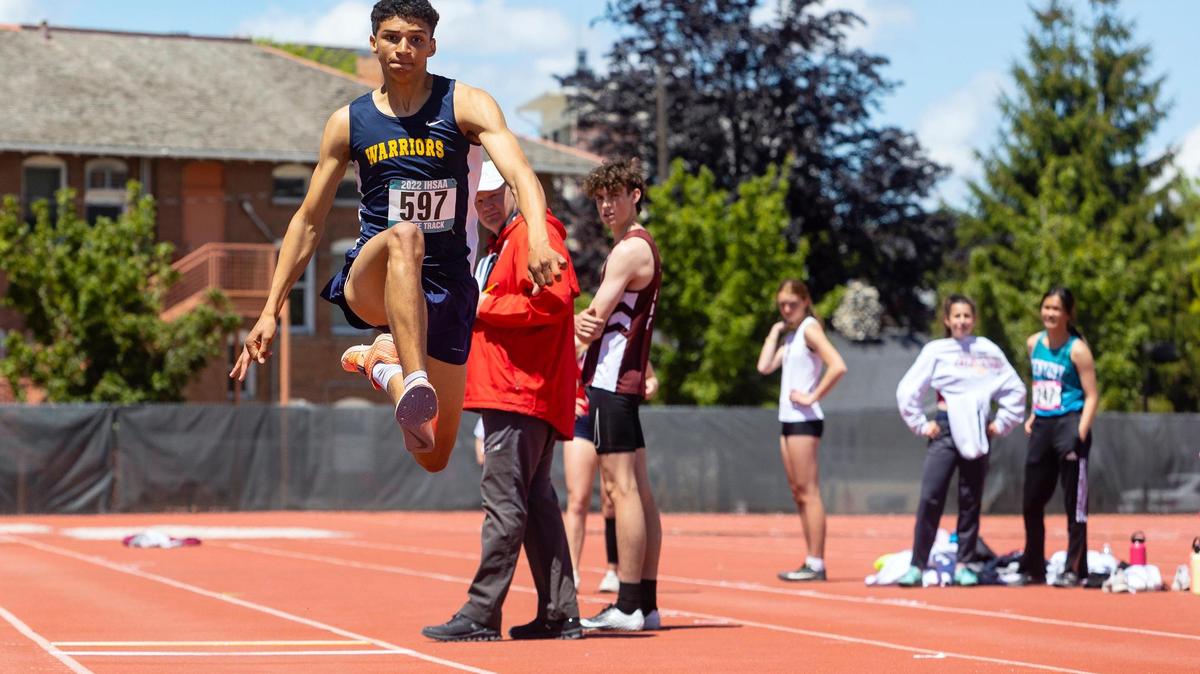 Meridian’s Eli Lawrence competes in the finals for triple jump at the 5A state track and field championships held at Dona Larsen Park in Boise on Friday.