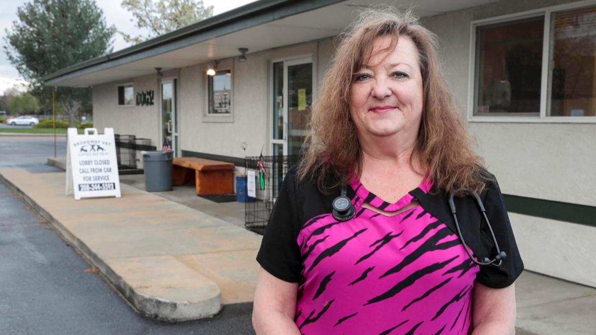 Dr. Dawn Sessions, owner and senior veterinarian at Broadway Veterinary Hospital in Boise, has adjusted the way her staff interacts with people dropping off their pets during the COVID-19 pandemic.