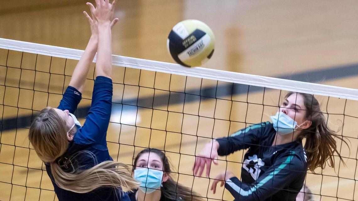 Middle blocker Liv Manning, right, is one of four starters back for Eagle, which was voted the preseason favorite in the 5A Southern Idaho Conference.
