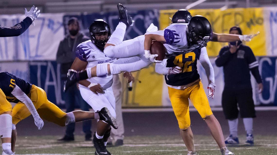 Rocky Mountain running back Arthur Williams goes airborne on a run in the third quarter against Meridian on Friday at Meridian High.