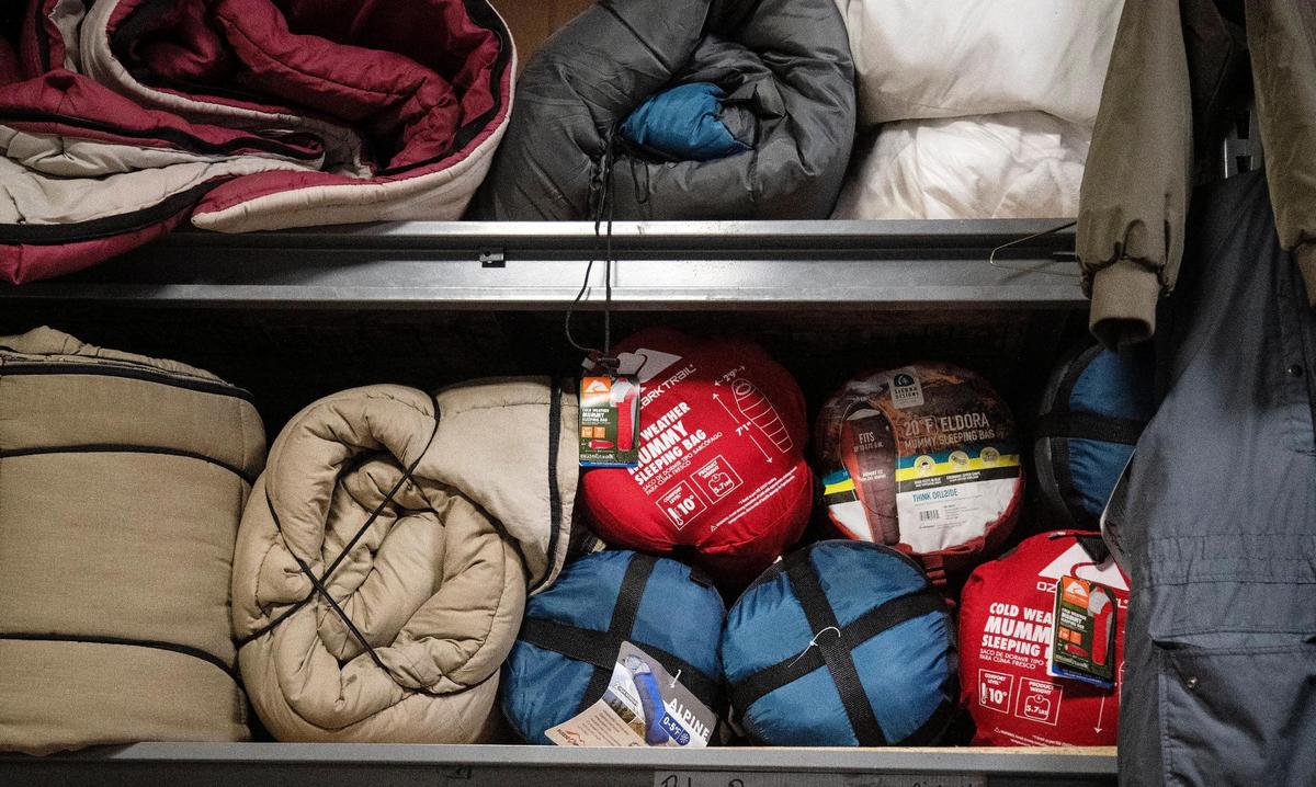 Sleeping bags that were donated to Interfaith Sanctuary over the weekend are stored in their laundry area on Tuesday.
