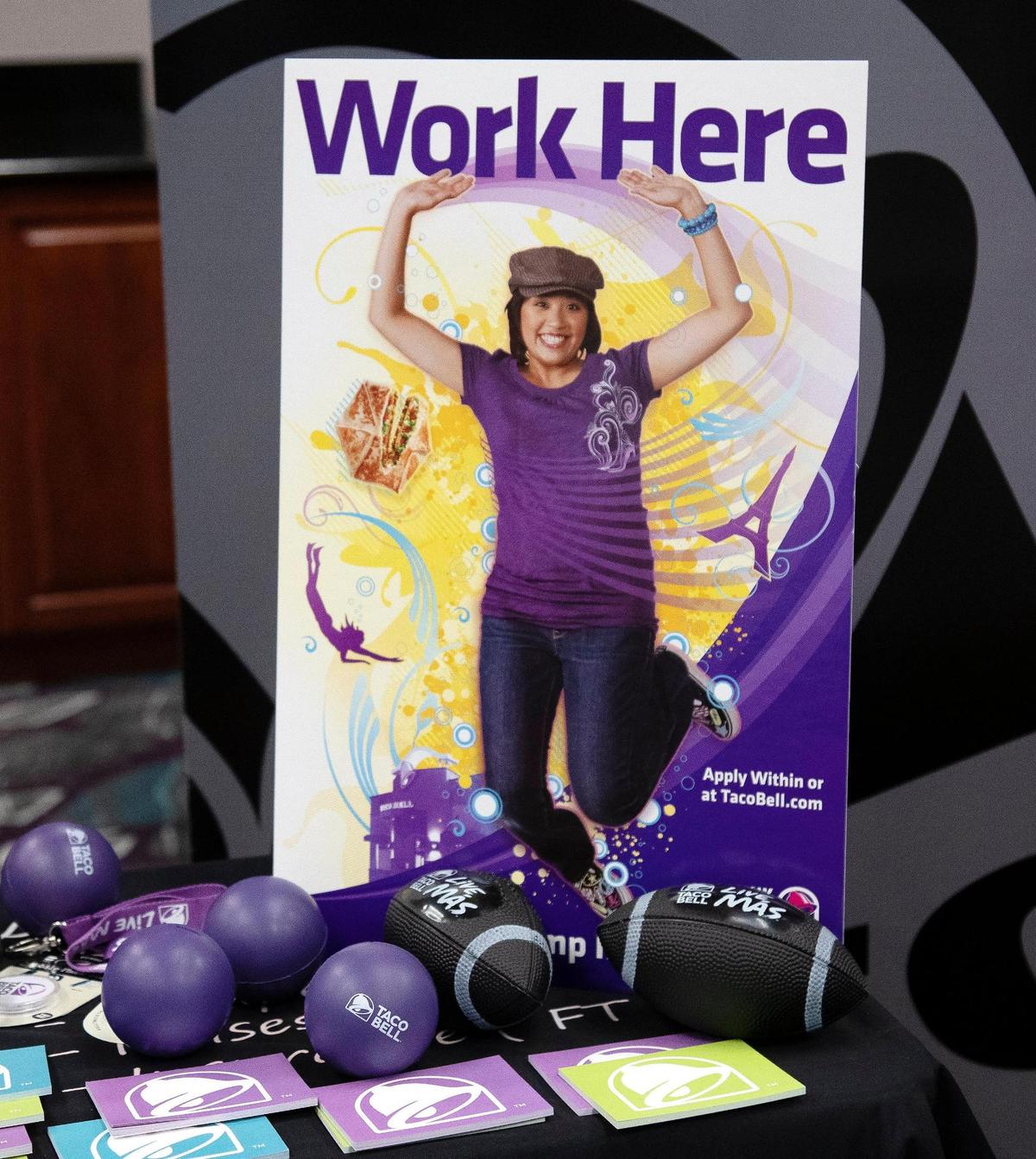 Even fast food chain Taco Bell sent recruiters to staff a booth at the job fair. Taco Bell District Manager Selena McNeal believes another pay increase is on the horizon.