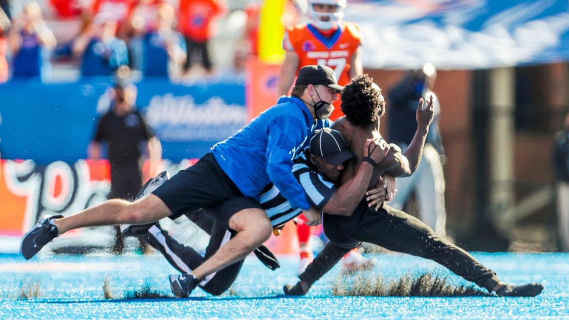 A spectator livened up the start of the 4th quarter with a shirtless run on The Blue as fans sang along to Garth Brooks’ “Friends in Low Places.” He was tackled by umpire Sheldon Davis and another game official. Boise State lost to Mountain West foe Nevada 41-31 on Saturday at Albertsons Stadium.