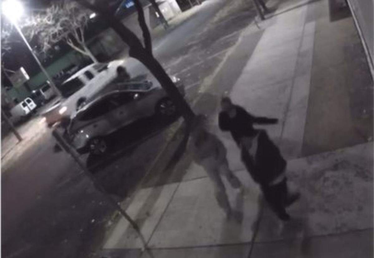 A still frame from an 18-second surveillance video captured at New Saint Andrews College North on Main Street in downtown Moscow showed three people, believed to be University of Idaho stabbing victims Kaylee Goncalves, left, and Madison Mogen, back, with a male companion, walking early on Nov. 13, 2022.