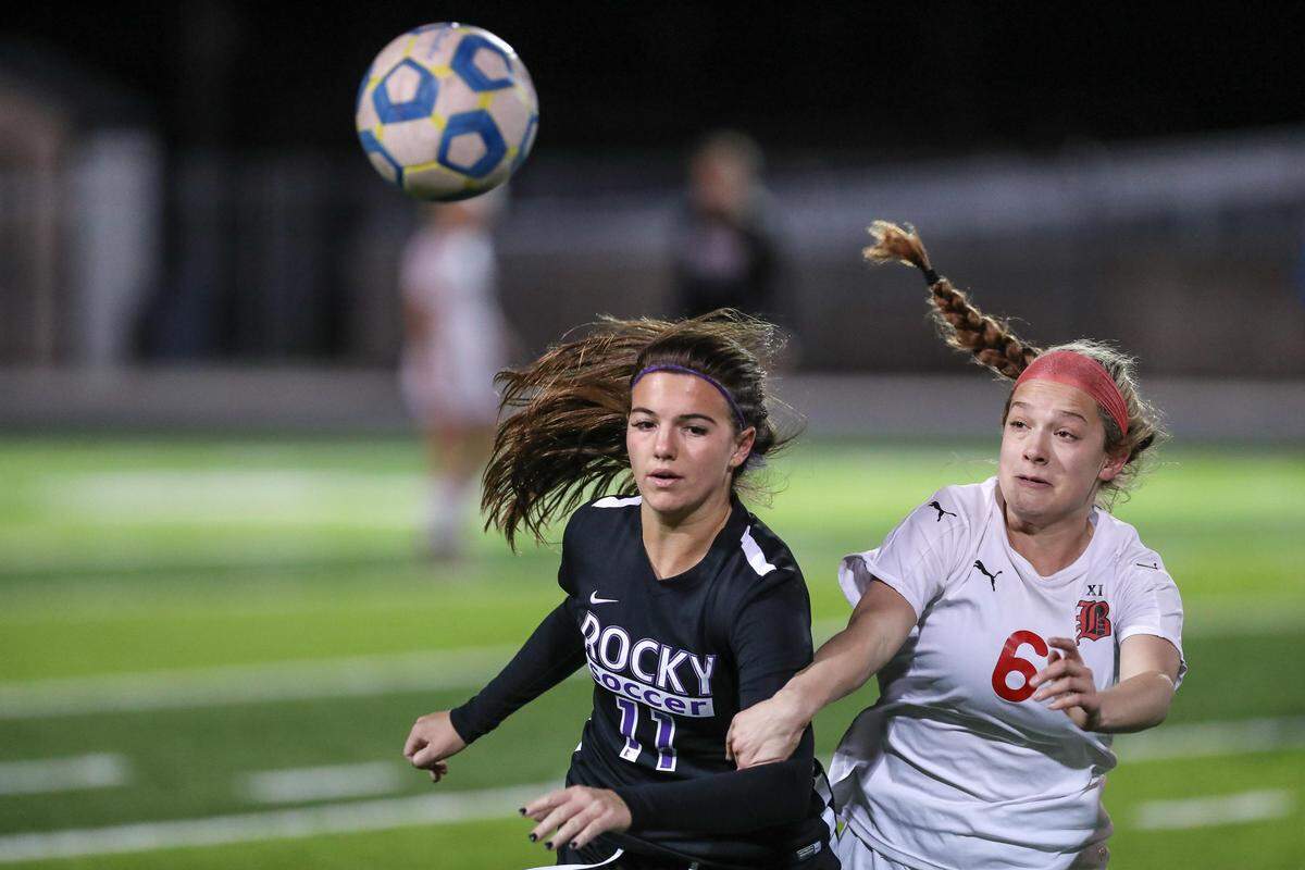 Rocky Mountain’s Larissa Wegner, left, and Boise’s Emi Blaser battle for the ball during the 5A girls soccer state championship Oct. 26.