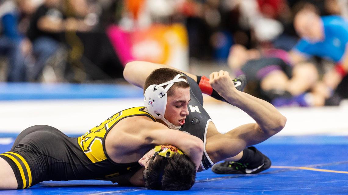 Bishop Kelly senior Matthew Martino, top, returned from a knee injury earlier this month to chase a fourth straight individual state title.