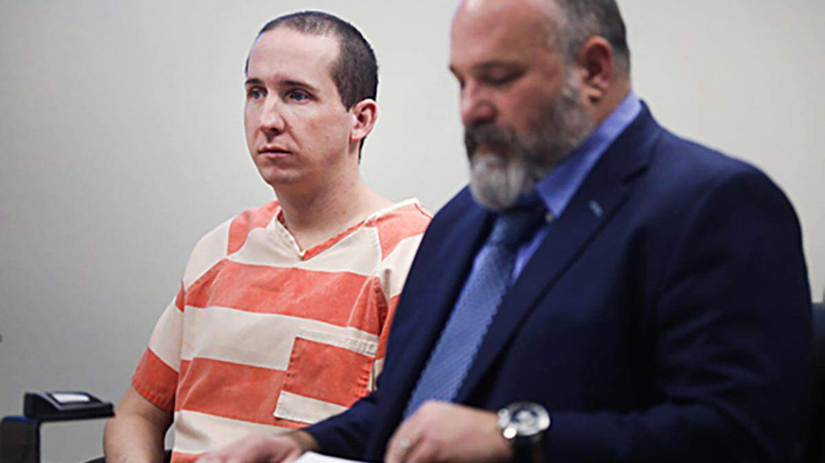 Tyler Kennedy, left, sits with his attorney at a hearing where he pleaded guilty to three counts of DUI causing death. The three people he killed were Driggs, Idaho, residents.