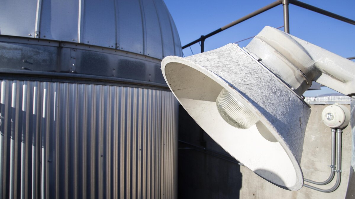 Adding shades or caps that deflect light downward is one of the simplest improvements that can be made by municipalities, businesses, and home owners to reduce light noise.