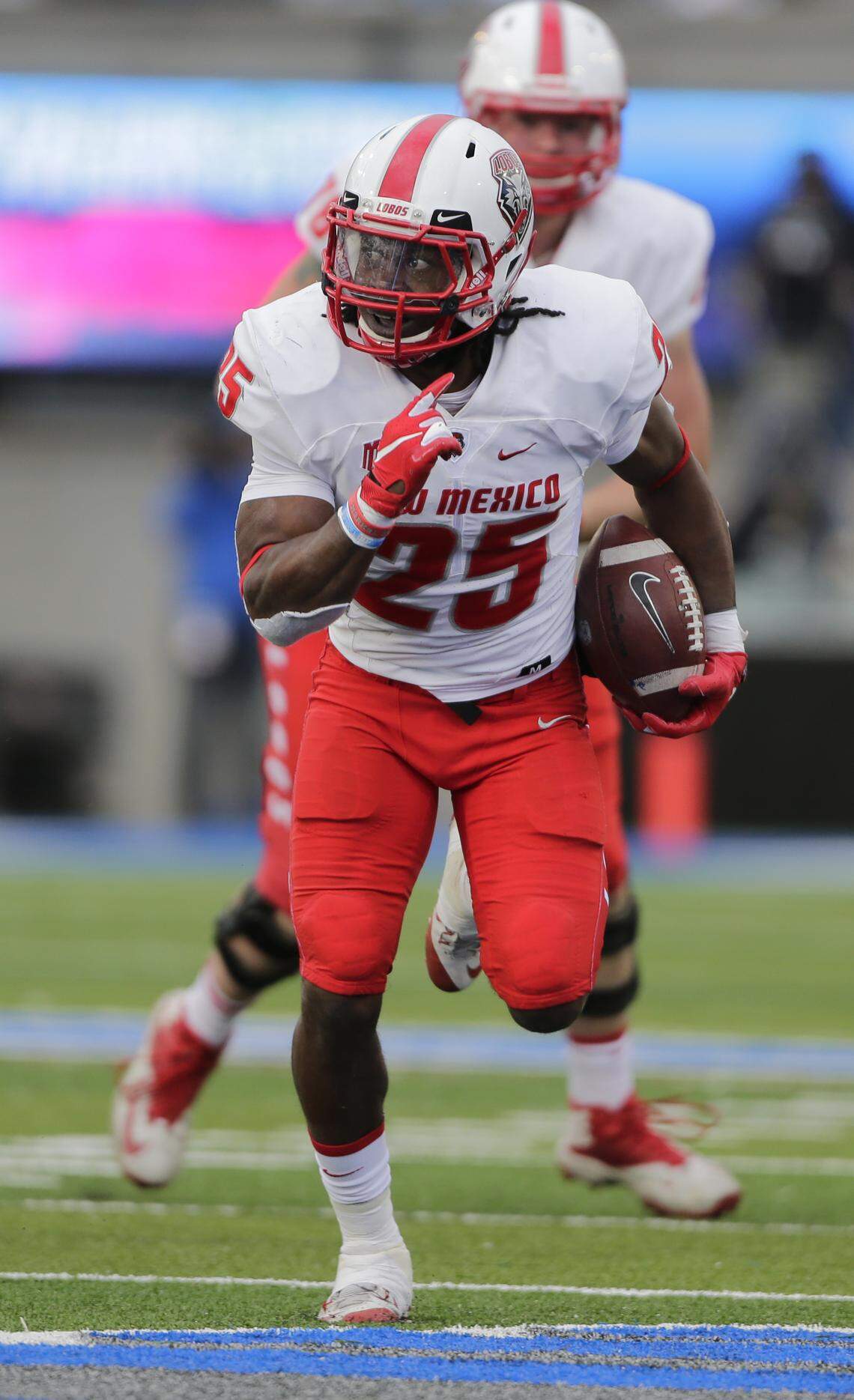 New Mexico running back Tyrone Owens runs against Air Force during the first half of an NCAA college football game, Saturday, Nov. 10, 2018, at Air Force Academy, Colo.