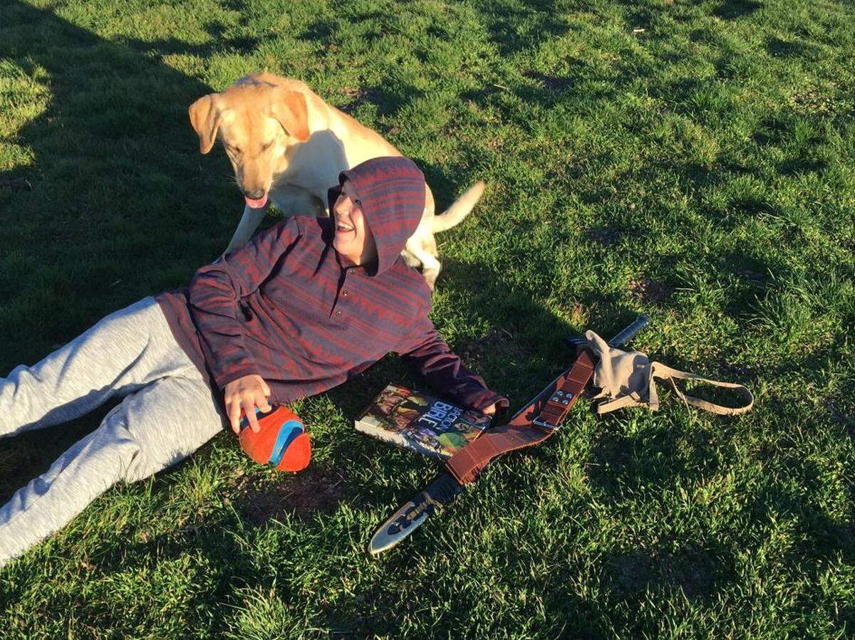 Canyon Mansfield with his dog, Kasey, before the March 2017 incident.