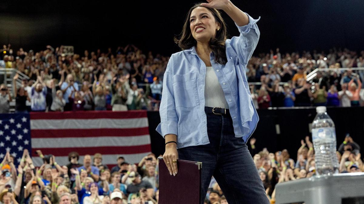 U.S. Rep. Alexandria Ocasio-Cortez (D-New York) takes the stage during the Fighting Oligarchy Tour at the Ford Idaho Center in Nampa, Monday, April 14, 2025.
