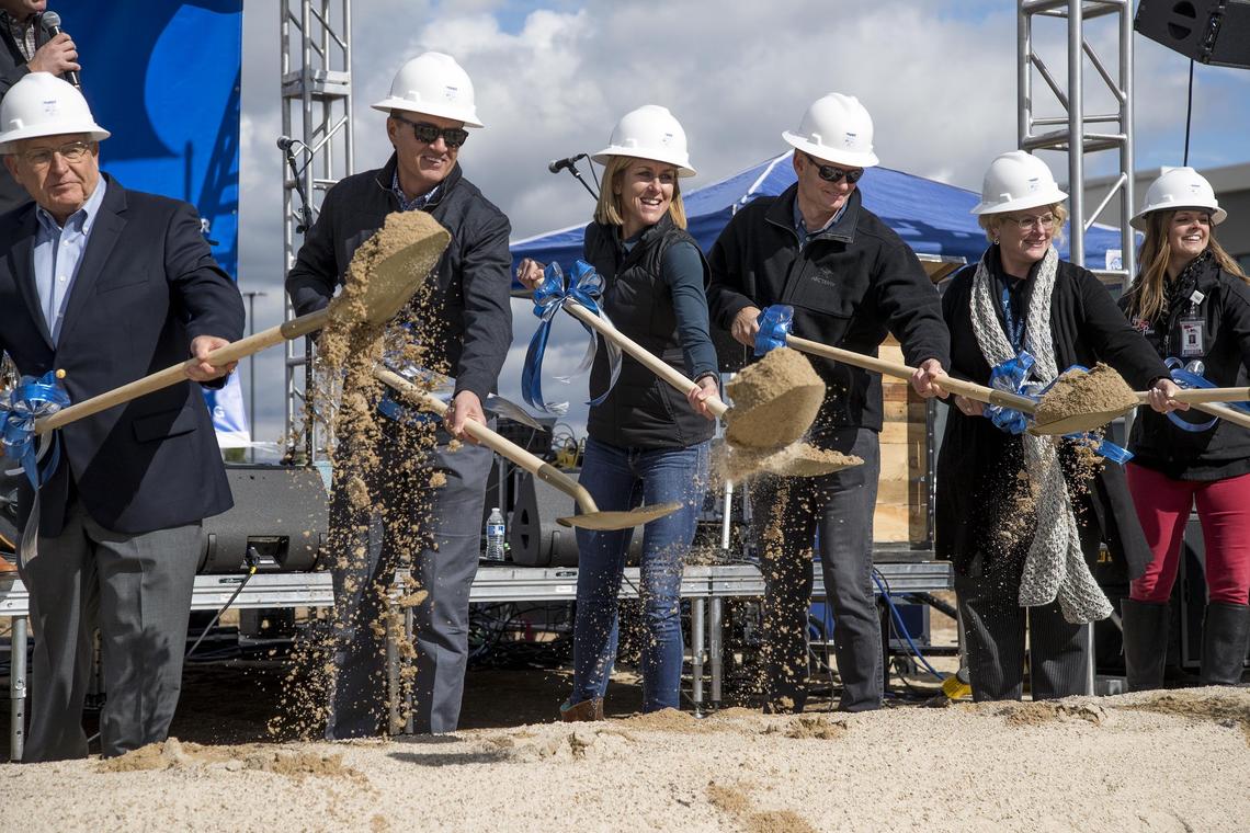  Kristin Armstrong, center, joins a long line of dignitaries in a ground breaking ceremony at Ten Mile Crossing in Meridian where PIVOT KA Lifestyle + Fitness, will open its first location.