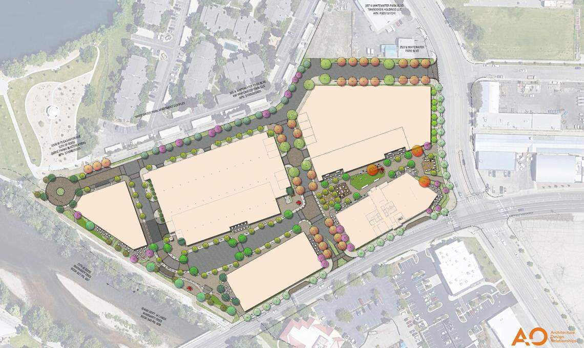 Plans show five buildings on the northwestern corner of Whitewater Park Boulevard and Main Street. A central plaza would be located between the two easternmost buildings.