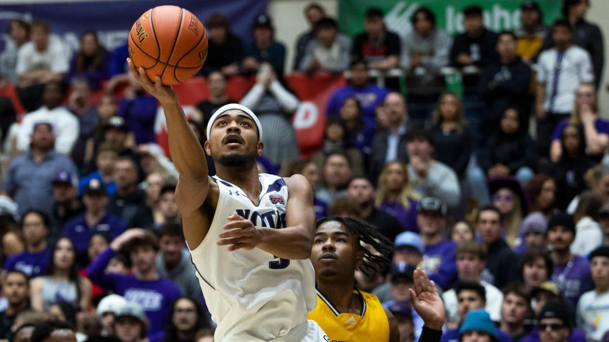 College of Idaho guard Charles Elzie drives to the hoop against Xavier University of Louisiana in the second round of the NAIA men’s basketball tournament on March 8. Elzie scored 21 points to lead the Yotes past Ottowa University (Arizona) in the NAIA semifinals on Friday.