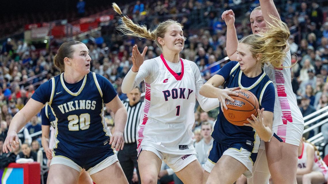 Middleton sophomore Megan Stewart controls the ball against Pocatello in the 5A girls basketball state championship game Saturday at the Ford Idaho Center in Nampa. Pocatello won 62-46.