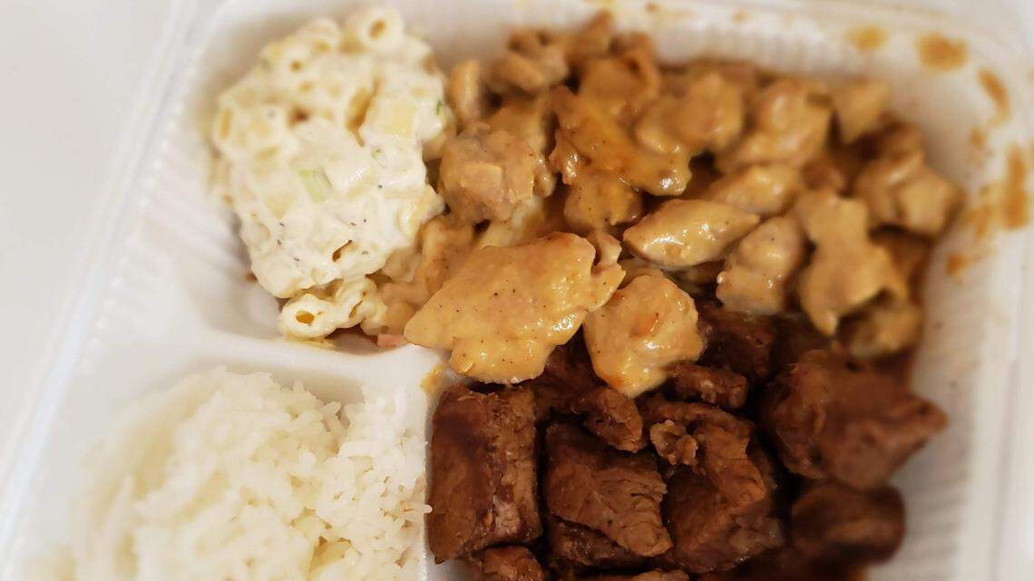 The Sweet and Spicy Peanut Chicken, top, is an absolute standout at Tiki Teriyaki Burger Time, a funky combo of a drive-in on the Boise Bench. The macaroni salad and rice work well as sides.