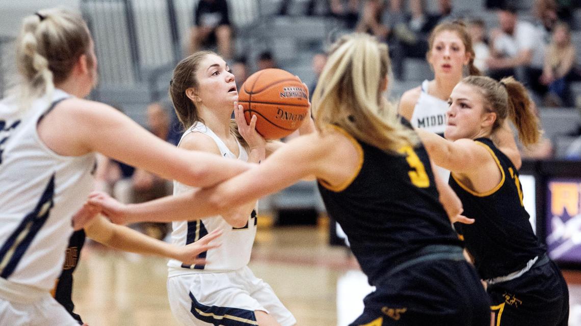 Middleton senior Payton Hymas lines up a shot as the Vikings topped Bishop Kelly 50-46 on Thursday to repeat as 4A District Three Tournament champs.