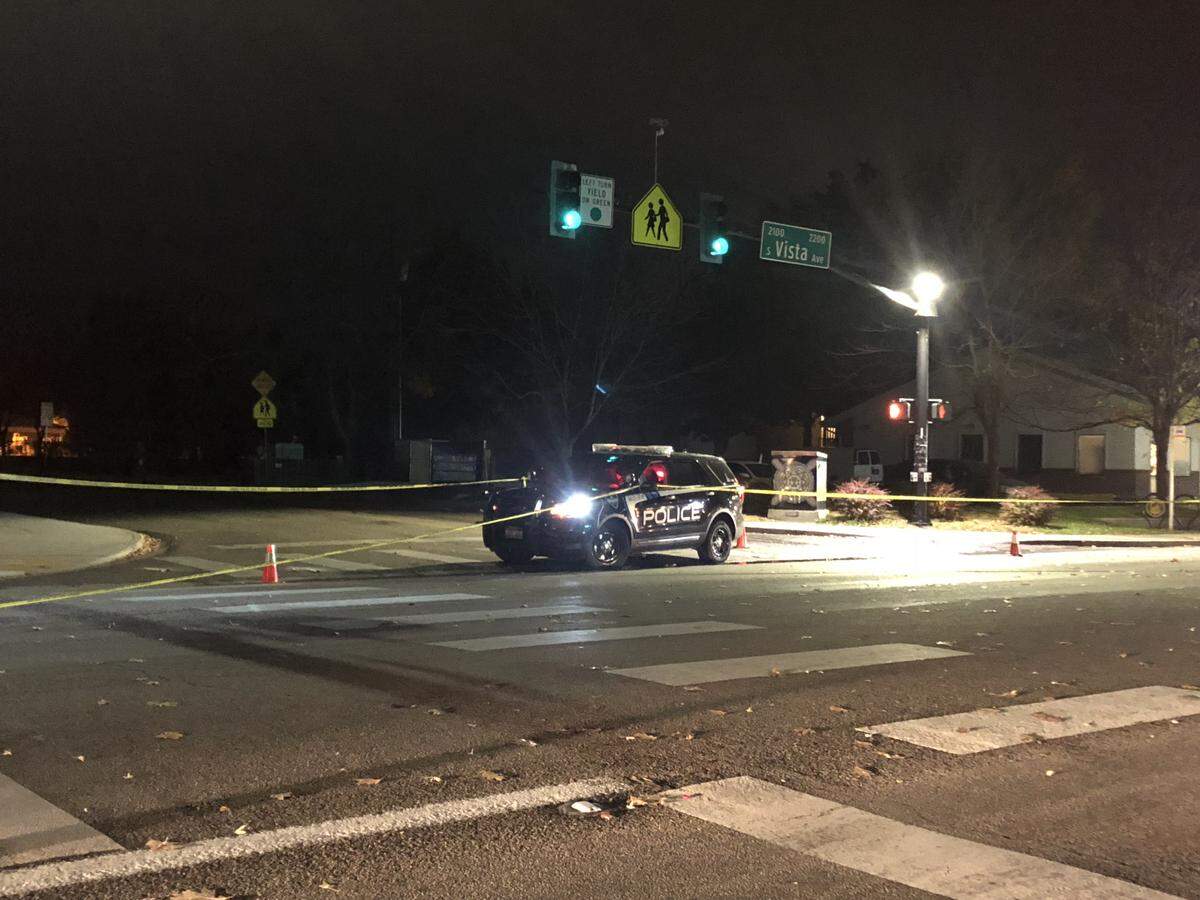 Crash reconstructionists take measurements at the scene of where a car struck and killed a pedestrian Wednesday night, Oct. 24, 2018. This view is from the north side of Targee Street at the intersection with Vista Avenue in Boise.
