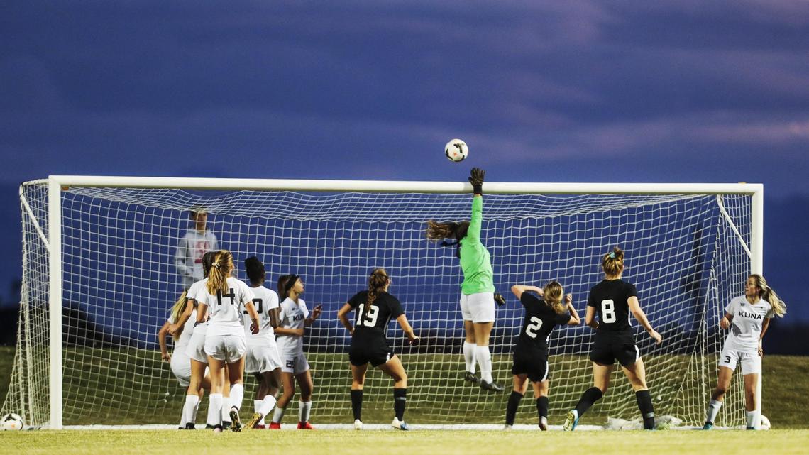 Kuna keeper Ariel Kotte deflects a Bishop Kelly corner kick over the top of the goal in the 4A District Three girls soccer championship Thursday, Oct. 17, 2019 at Middleton High School.