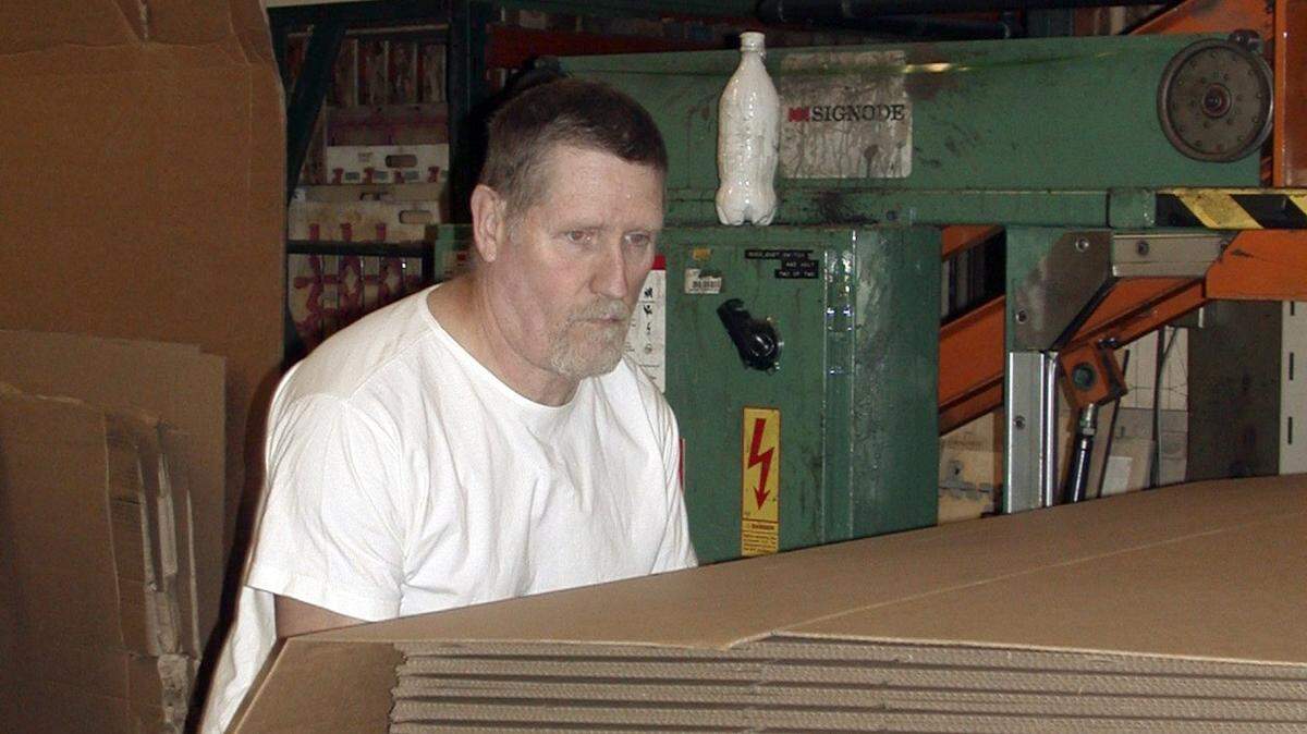 Charles Fain served 18 years of a murder conviction that was later overturned. After his release he got a job working a banding machine at Dixon Container Co., a business that believes in hiring former criminal offenders.