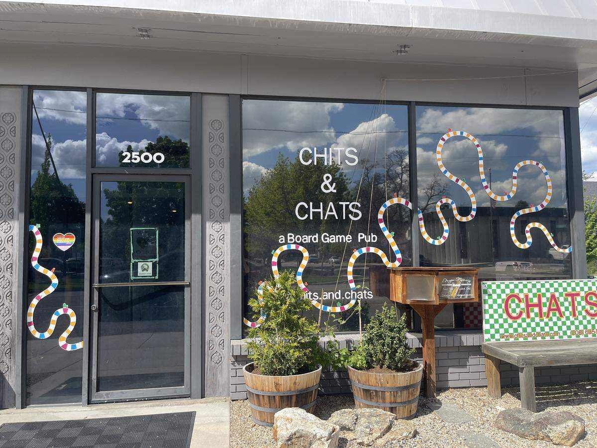 The front entrance of Boise’s Chits and Chats displays a colorful reference to the snakes and ladders board game. To cozy up with your own game at this pub is only $5 an hour.