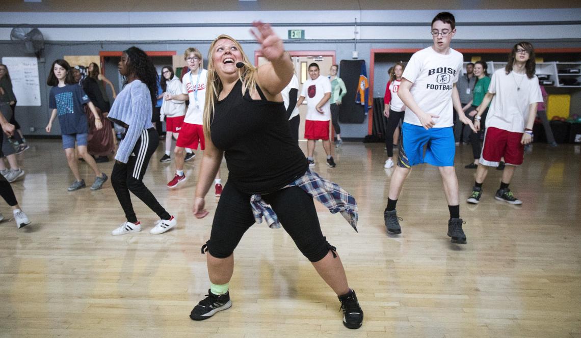 Power dance instructor Kim Chouinard leads a full class of Boise High School physical education students, plus a few other attendees.